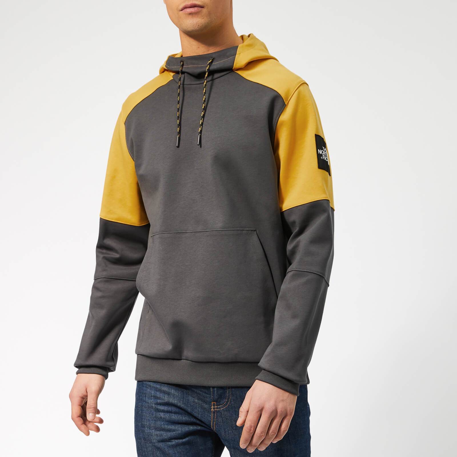 grey and yellow north face hoodie