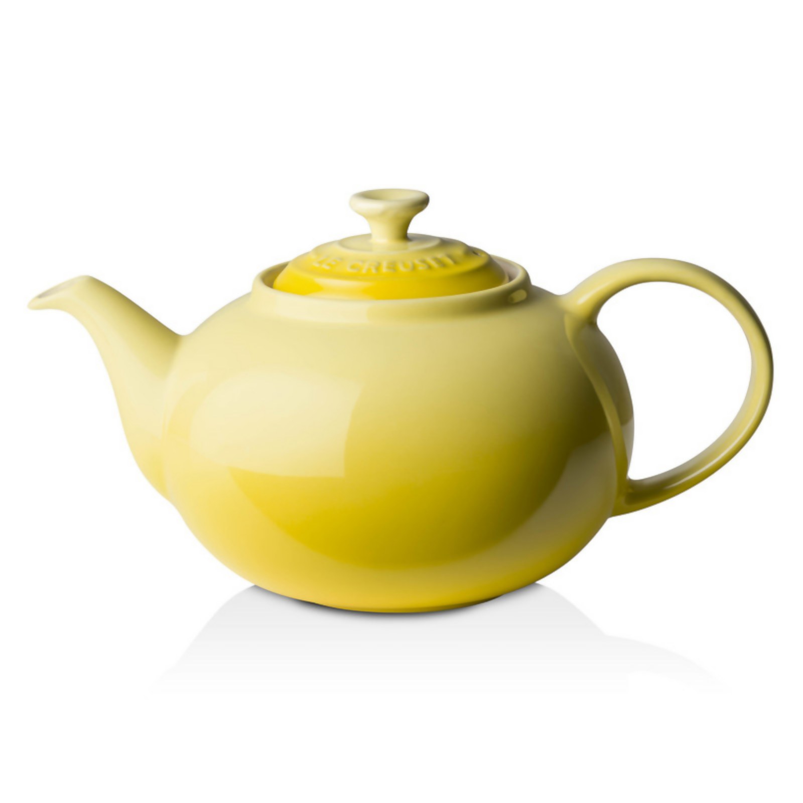 Le Creuset Stoneware Classic Teapot Soleil Yellow Free Uk Delivery Available Producing some of the world's finest cookware, le creuset produced its first cast iron pots in 1925 in france. le creuset stoneware classic teapot soleil yellow